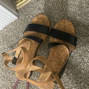 tan and black sandals